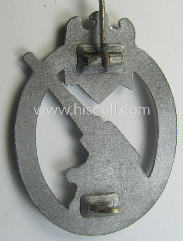 'Heeres-Flakkampf-Abzeichen' being a non-maker-marked- and/or zinc- (ie. 'Feinzink'-) based specimen of the so-called: 'pillow-crimped'-pattern (as was produced by a to date still unidentified maker)