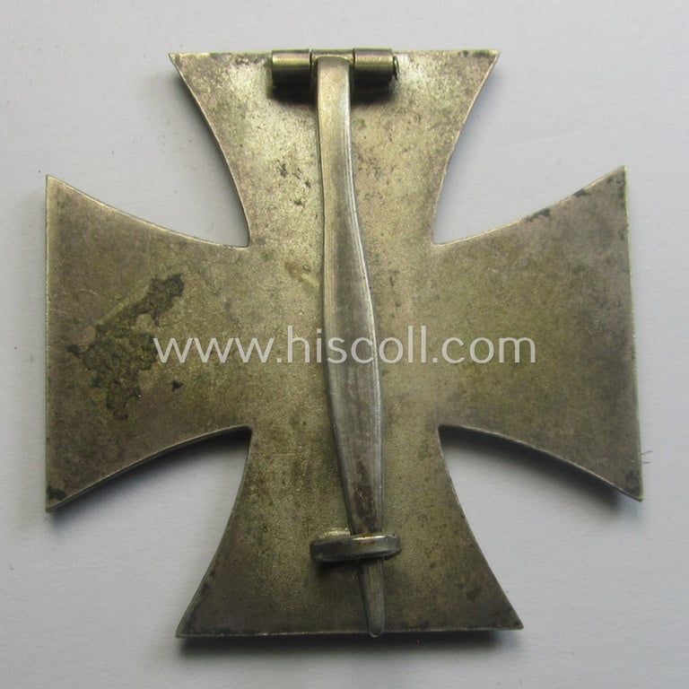 'Eisernes Kreuz 1. Klasse' (ie. Iron Cross 1st Class) being a non-maker-marked example as was (I deem) produced by the company: 'B.H. Mayer's Kunstprägeanstalt'
