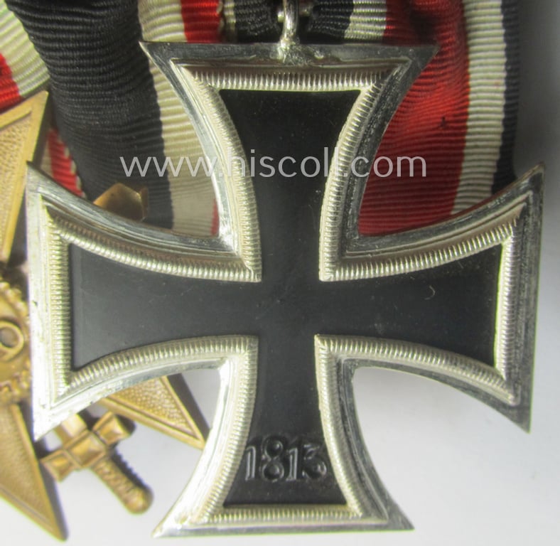 Superb, 4-pieced WH (LW) medal-bar (ie. 'Ordenspange')showing an: 'EK II.Kl.' (in the 'Schinkel'-pattern!), a: 'KvK II.Kl. mit Schw.', a: WH (LW) so-called: 'DA für 4 Jahre t. Dienste' and a: WH Czech 'Anschluss'-medal: '1. Oktober 1938'
