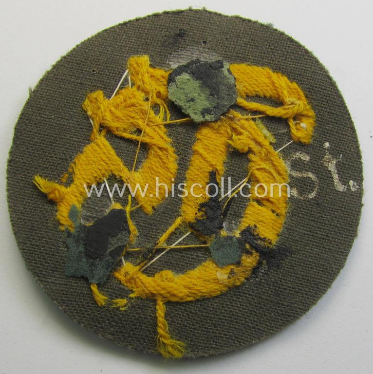 WH (Heeres) hand-embroidered, trade- and/or special-career insignia (ie. 'Tätigkeitsabzeichen') as executed on a darker-green-coloured background as was specifically intended for a: 'Truppensattlermeister'