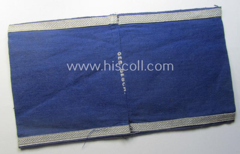 Darker-blue-coloured, RLB (or: 'Reichsluftschutzbund') so-called: 'Amtsträger-Armbinde für Führer' depicting the typical 'RLB'-logo (with lettering) and that comes in a moderately used- ie. worn, condition