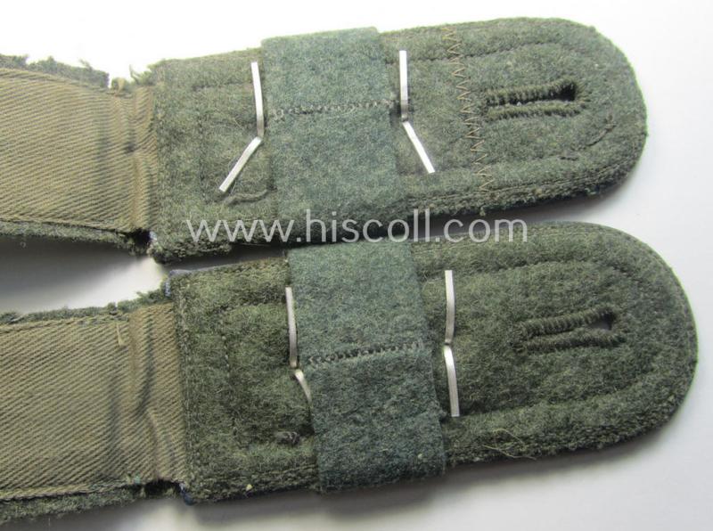 Pair of mid-war-period, so-called: 'M41 o. M43'-pattern, WH (Heeres) NCO-type shoulderstraps that comes with its accompanying 'Überschube'-pair as was intended for an: 'Oberfeldwebel des Nachschub-Abtgs. 33'