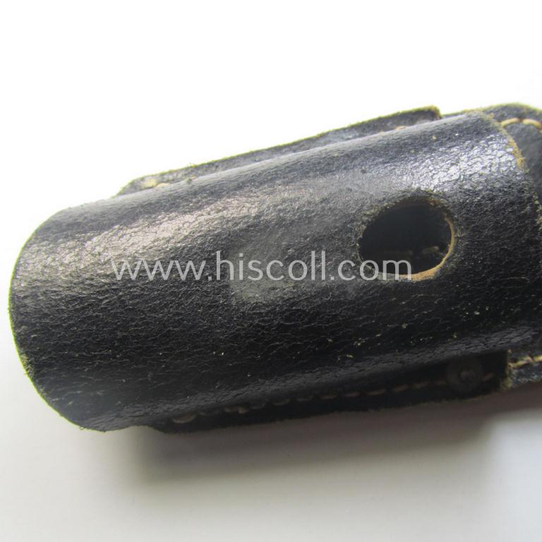 Genuine-leather-based- and/or black-coloured, 'standard-pattern' (and I deem later-war-period) WH (Heeres, Waffen-SS, Luftwaffe etc.) so-called: K98 bayonet-frog (ie. 'Tragetasche o. Koppelschuh') being a maker-marked (ie. 'RbN.'-numbered) exam...