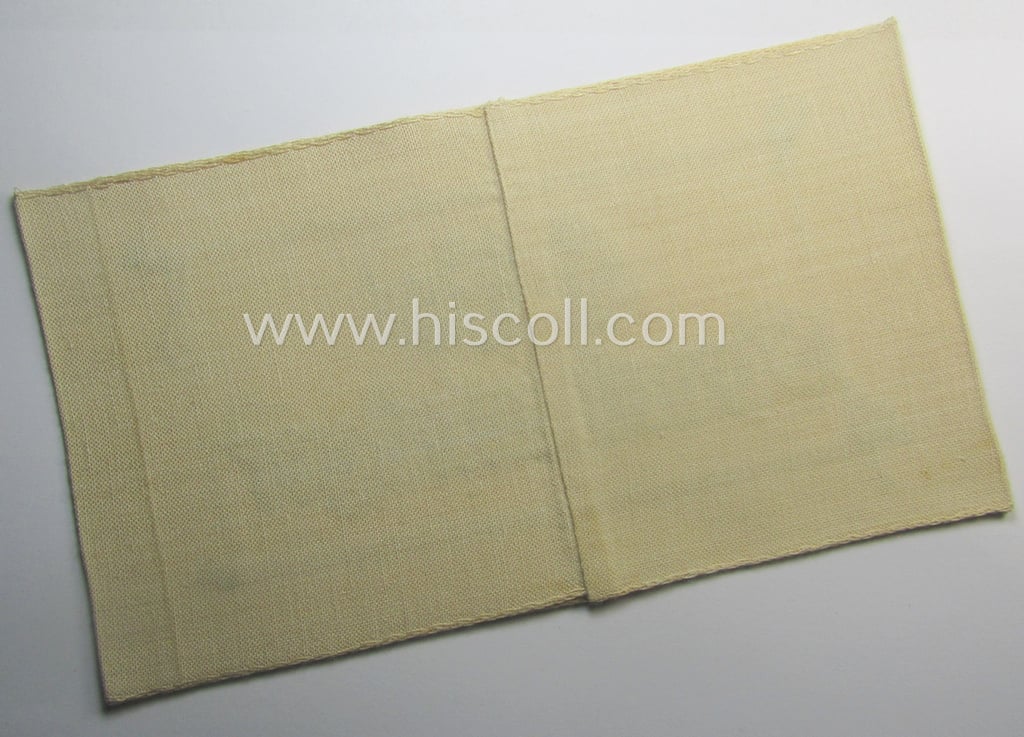 Beige-white-coloured- and/or linnen-based armband (ie. 'Armbinde') as was executed in the 'thicker-styled' fabric as was intended for WH (Heeres) staff-members working as: 'Hilfs-Krankenträger'