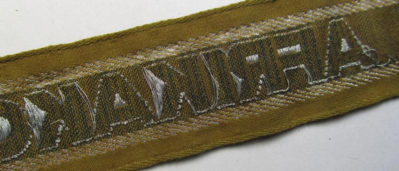 Superb, 'BeVo'-like cuff-title (ie. 'Ärmelstreifen') entitled: 'Afrikakorps' being a with certainty issued and worn example that comes in an overall nice- (ie. minimally shortened- and presumably once tunic-attached-), condition