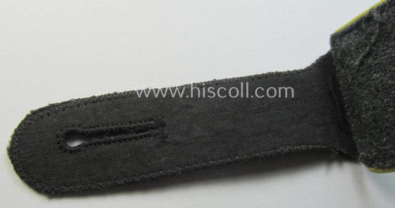 Attractive - albeit regrettably single! - Waffen-SS, EM-type shoulderstrap as piped in the bright-yellow-coloured branchcolour as was intended for usage by an: 'SS-Mann' who served within the: 'SS-Nachrichten-Truppen'