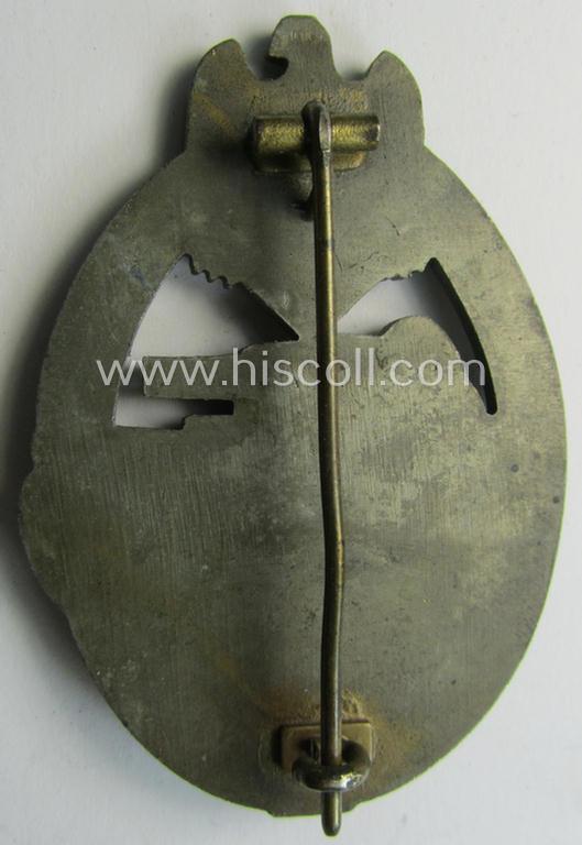 Attractive, 'Panzerkampfabzeichen in Bronze' (or: bronze-class panzer assault badge or PAB) being a neat zinc- (ie. 'Feinzink'-) version (of the so-called: 'flat-back'-pattern) as was procuced by the: 'Alois Rettenmaier'-company