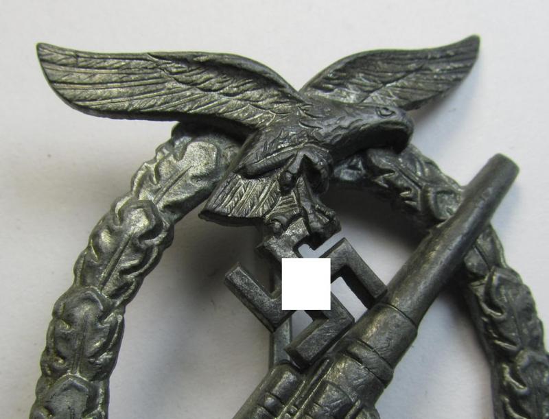 Superb - and rarely seen! - 'Feinzink'-based- example of a maker- (ie. 'ÜÜ'-) marked WH (Luftwaffe) 'Flakkampfabzeichen' (or: airforce anti-aircraft badge) being a very detailed example as was produced by the: the: 'E. Ferd. Wiedmann'-company
