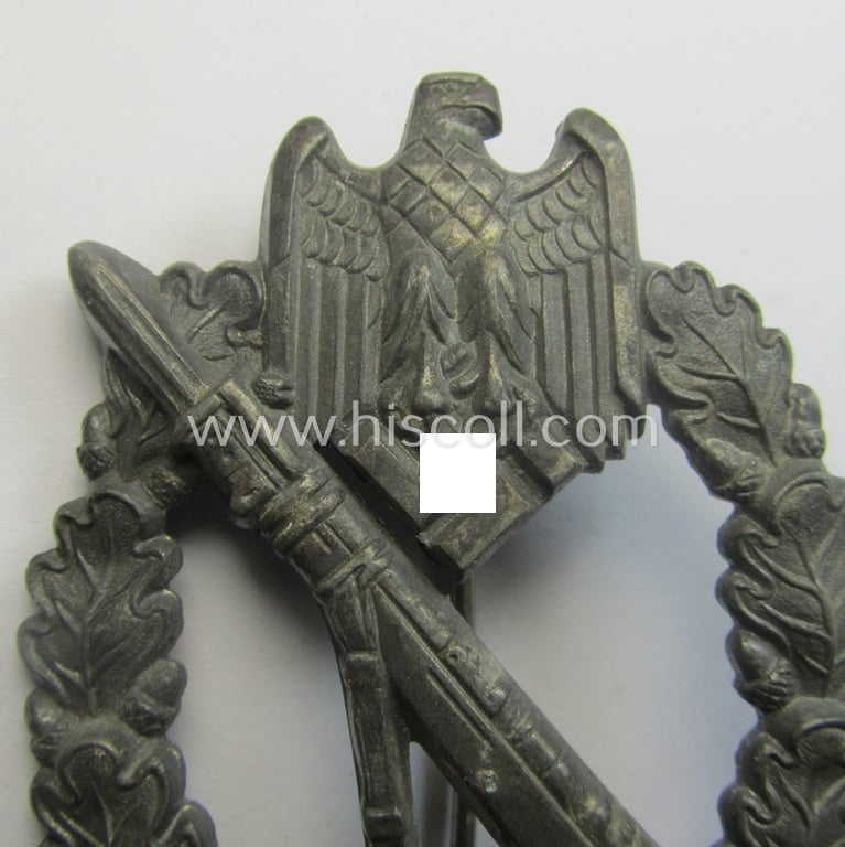 'Infanterie Sturmabzeichen in Silber' (or: silber-class infantry assault-badge ie. IAB) being a maker- (ie. 'S.H.u.C.o. 41'-) marked example as executed in bronze-toned, zinc-based metal (ie. 'Feinzink')