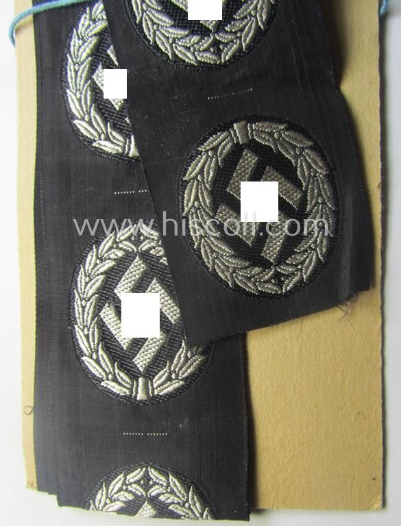 EM- (ie. NCO-) type, so-called: 'Schutzmannschaften' (or: 'Schuma') cap-badge as executed in greyish-coloured thread onto a black-coloured- (ie. 'SS-Polizei'- ie. 'SD'-related-) background