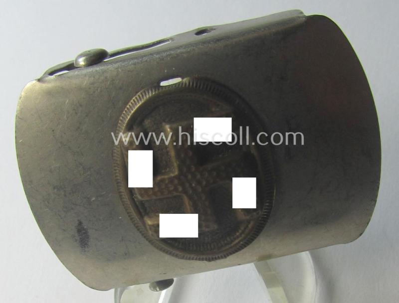 Bright-silver-toned (ie. chromed metal-based) patriotic belt-buckle (ie. N.S.D.A.P.-supportive-piece) that shows a bronze-toned swastika surrounded by a pronounced rim
