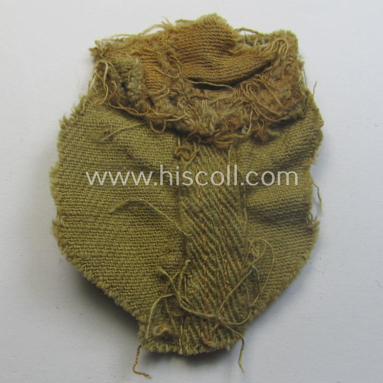 Unusually 'cut-out', early-pattern, HJ (ie. Hitlerjugend) beige- (ie. tan-) coloured, 'M34'-pattern side-cap-eagle (ie. 'Adler fürs Schiffchen o. Sommermütze nach Vorschrift der RJF') being a moderately used example