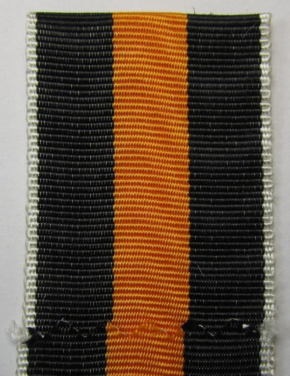 Neat spare-part: a bright-orange-coloured(!), non-confectioned- (ie. full length- and 19 cms. long-sized-) ribbon (ie. 'Bandabschitt') for the: WH Czech occupation-medal: '1 October 1938' and that comes in 'virtually mint ie. unissued condition