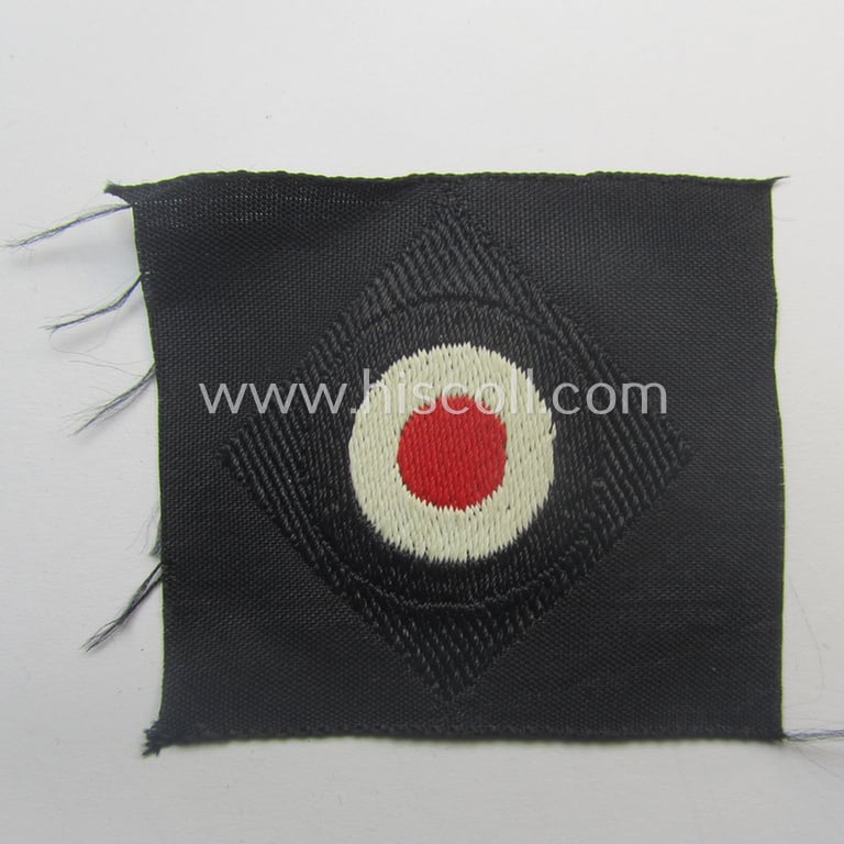 Mid-war-period, WH (Heeres) 'Panzer' cap-eagle & cocarde-set (ie. 'Schiffchenmützen-Adler u. Kokarde-Satz für Mannschaften u. Uffz.') being a 'virtually mint' set as executed in bluish-grey-coloured linnen onto a black-coloured background