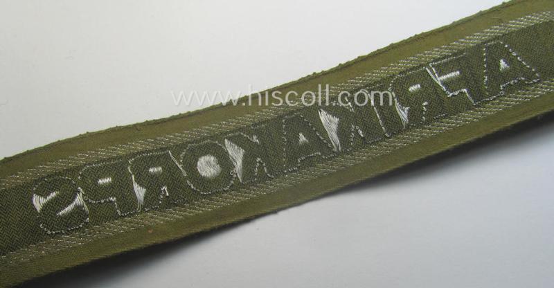 'BeVo'-like cuff-title (ie. 'Ärmelstreifen') entitled: 'Afrikakorps' being a presumably issued but simply never worn example that comes in an overall very nice- (ie. non-shortened- and never tunic-attached-), condition
