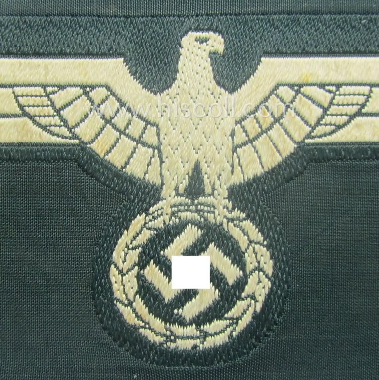 WH (Heeres) early- (ie. pre-war-) period- and/or white-coloured breast-eagle of the: 'M36'- (ie. 'M40'-) pattern as was executed in the 'BeVo'-weave pattern on a darker-green-coloured background