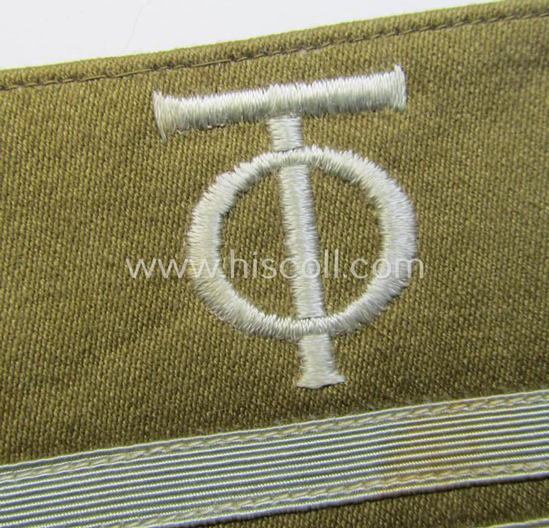 Attractive - and actually scarcely seen! - single example of an OT- (ie.: 'Organisation Todt'-) related golden-brown-coloured, (I deem) officers'-pattern rank-patch (ie. 'OT-Dienstgraden-Abzeichen')
