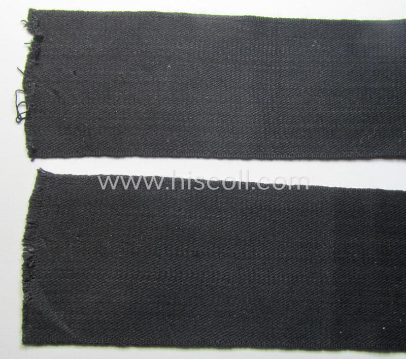 Superb - and most certainly rarely seen! - WH (Heeres) related cuff-title (ie. 'Ärmelstreifen für Führer') being a typical black-coloured- and linnen-based example showing the (neatly silver-toned- and 'flatwire'-woven!) text that reads: 'Feldpo...