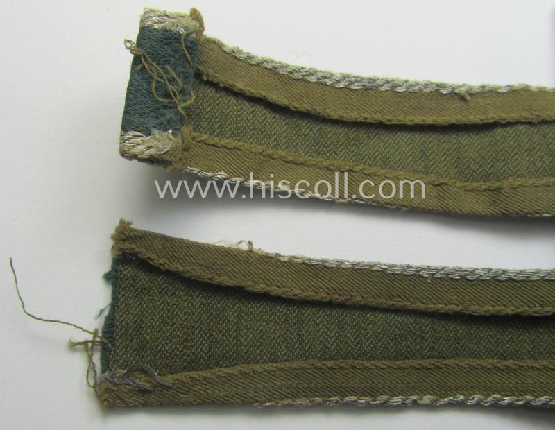 Truly worn, 'BeVo'-like cuff-title (ie. 'Ärmelstreifen') entitled: 'Afrikakorps' being a with certainty issued example that comes in an overall nice- (ie. somewhat shortened- and/or once tunic-attached-), condition