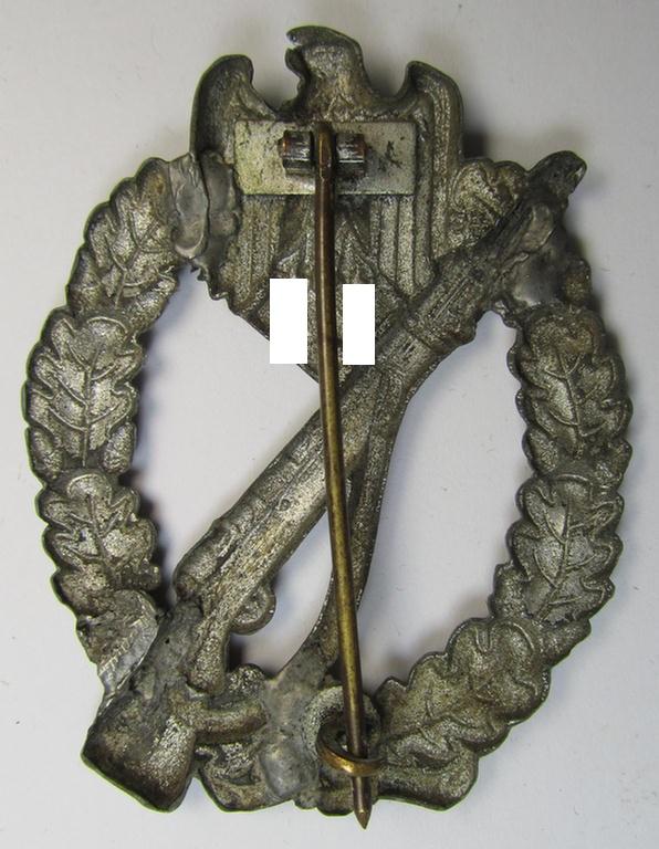 Attractive, 'hollow-back' 'Infanterie Sturmabzeichen in Silber' (or: silver infantry-assault badge ie. IAB) being a non-maker-marked example as executed in zinc-based metal (ie. 'Feinzink') as was produced by the: 'Wilh. Deumer'-company