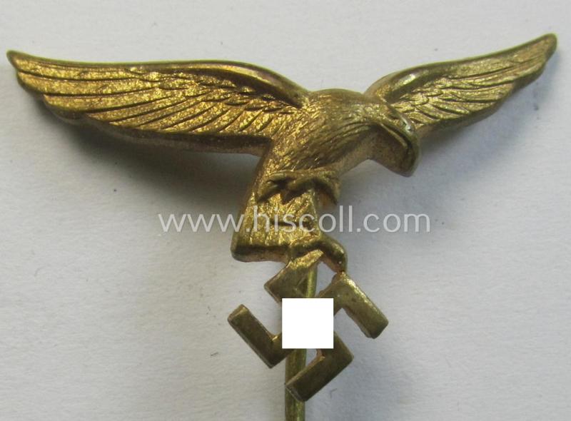 Bright-golden-toned lapel-pin (ie. 'Zivilabzeichen') to be worn on the civil attire as was intended for usage by the various staff-members of the 'Luftwaffe' (depicting an early-pattern- ie. 'down-tailed'-eagle)