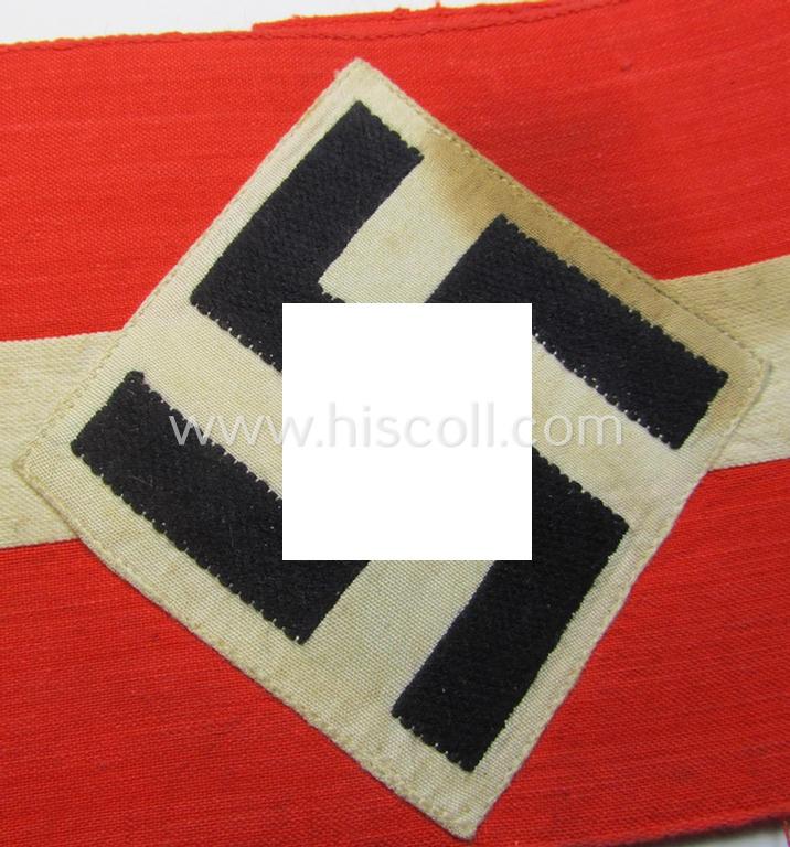 Attractive - and nowadays scarcely found! - 'standard'- (ie. entirely woven) pattern, bright-red-coloured HJ- (ie. 'Hitlerjugend'-) related armband (ie. 'Armbinde') being a moderately worn- ie. used example that regrettably misses its 'RzM'-e...