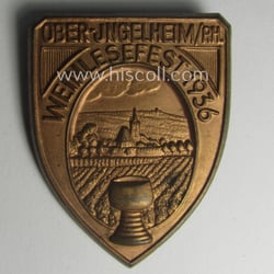 Commemorative, reddish-bronze-toned day-badge (ie. 'tinnie') as issued to...