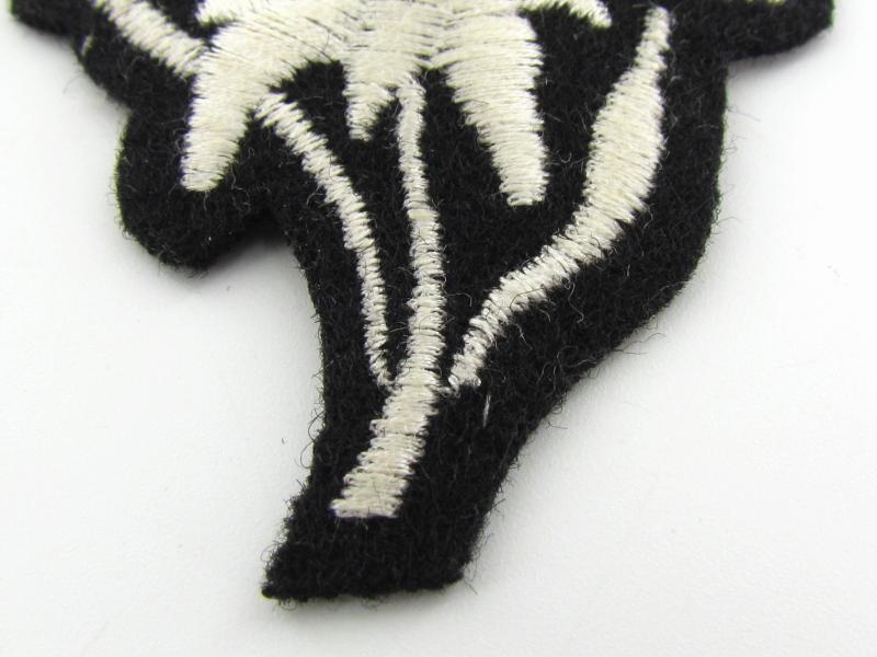 Waffen SS 'Gebirgsjäger' Edelweiss cloth cap badge