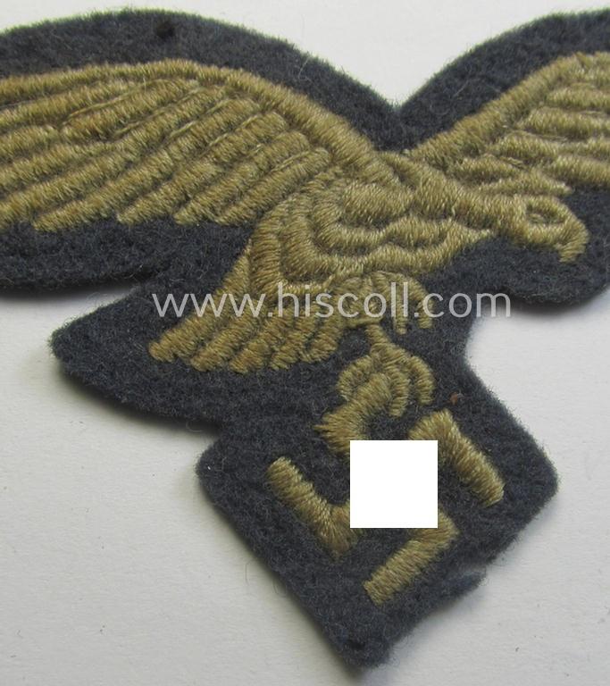 Attractive - and clearly used- ie. carefully tunic-removed! - WH (Luftwaffe) EM- (ie. eventually NCO-) type breasteagle (being a once tunic-attached example as executed in typical machine-embroidered-pattern)