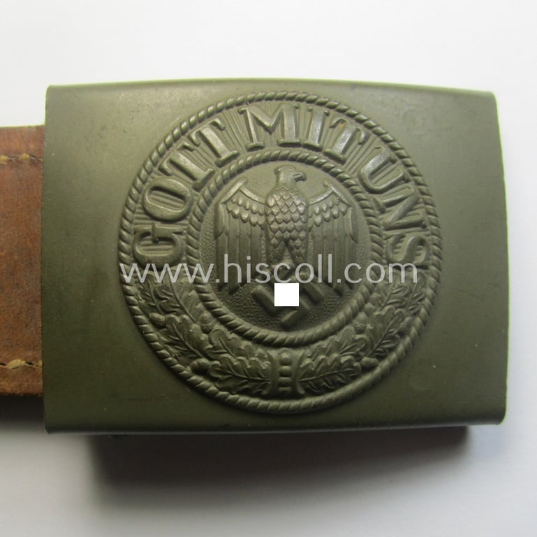 Stunning, WH (Heeres) field-grey-coloured- and/or steel-based belt-buckle, being a maker- (ie. 'J. C. Maedicke'-) marked- and/or: '1941'-dated example on its leather-based tab and that comes in a stonemint- ie. unissued-, condition