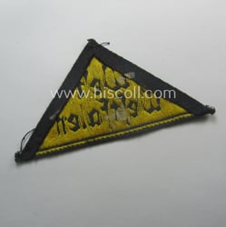 Truly used and/or worn 'HJ' ('Hitlerjugend') district-triangle (ie....