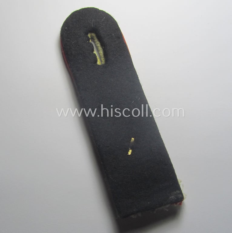 Neat - albeit regrettably single! - Waffen-SS officers'-pattern shoulderboard as piped in the bright-red-coloured branchcolour as was intended for usage by an: 'SS-Obersturmführer' who served within the: 'Waffen-SS (Sturm)Artillerie-Trpn.'
