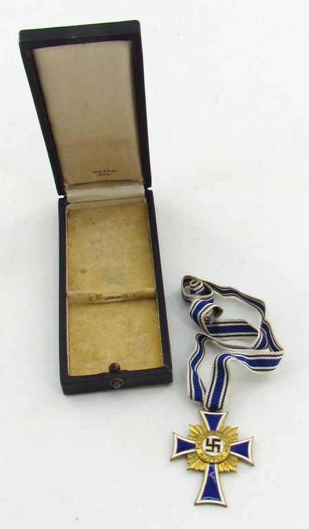 Mother’s cross in gold with box ( Ochs & Bonn Hanau )