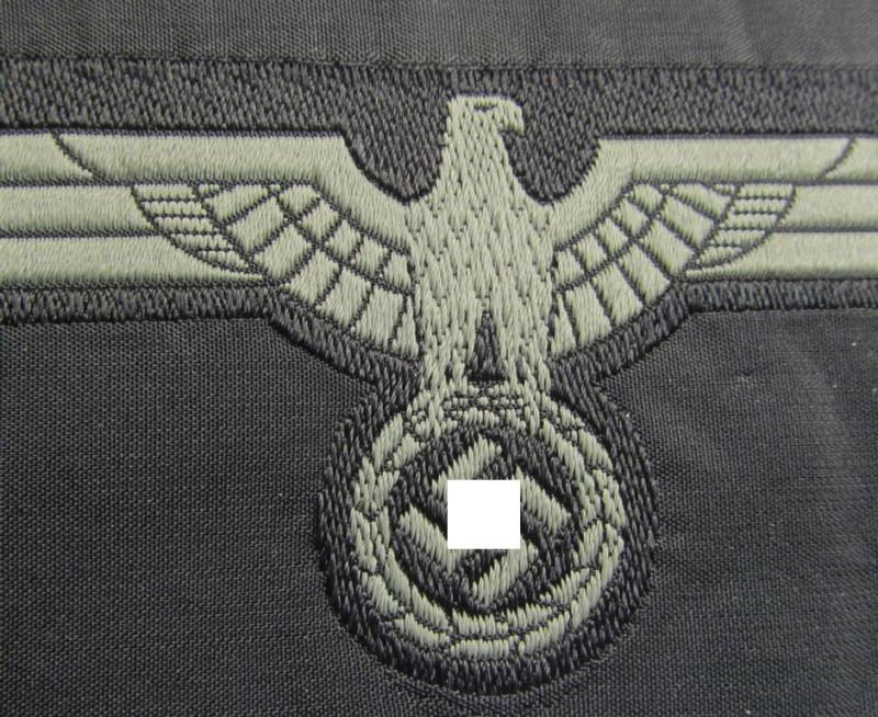 Later- (ie. mid-war-) period, WH (Heeres) 'Panzer'-type breast-eagle (ie. 'Brustadler für Panzertruppen') being a 'virtually mint- ie. unissued' example as executed in bluish-grey-coloured linnen on a black-coloured background