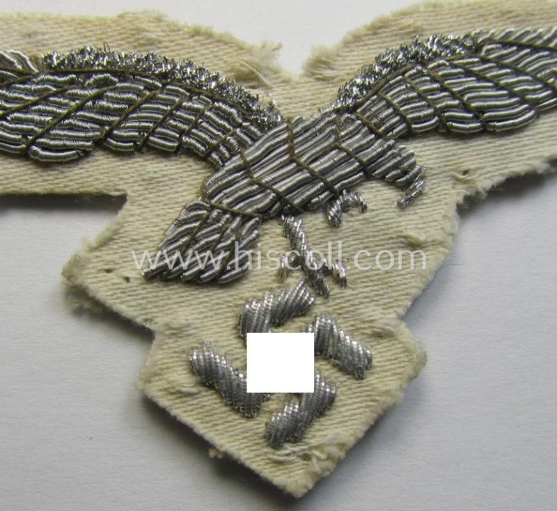 Attractive - and scarcely seen! - WH (Luftwaffe) officers'-type visor-cap eagle that is neatly hand-embroidered on beige-white-coloured linnen as was specifically used for the white-topped LW officer-type visor-caps (ie. 'Offz.-Sommer-Schirmmützen...
