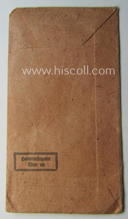Empty 'Zellstoff'-based pouch as was intended for a medal: 'Winterschlacht im Osten 1941/42' as was produced by the company: 'Hauptmünzamt - Wien' (ie. 'Hersteller 30')