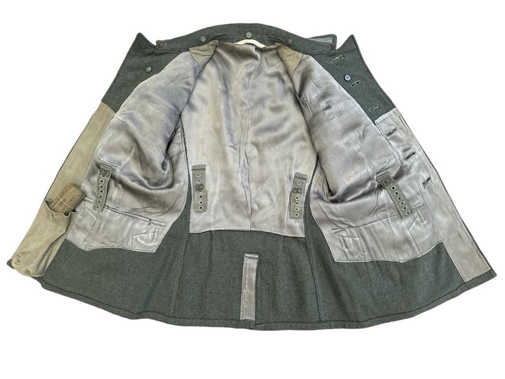 Wehrmacht Heer M43 EM field tunic With Original Applied Insignia