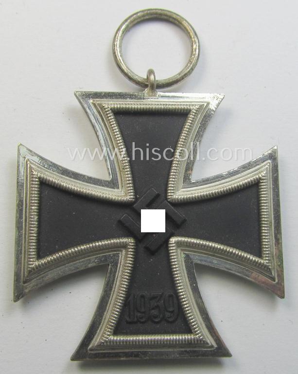 'Eisernes Kreuz II. Klasse' being a (typical) non-maker-marked example that comes together with its original- and never-mounted ribbon (ie. 'Bandabschnitt') as was produced by a (by me) unidentified maker (ie. 'Hersteller')