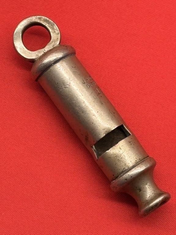 TWO AUTHENTIC ORIGINAL BRITISH OFFICERS WWI 1916 TRENCH WHISTLES AND LANYARD.