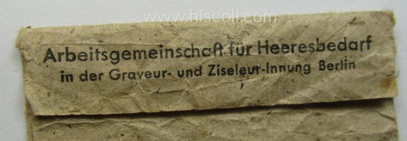 Empty 'variant'-pattern, 'Zellstoff'-based pouch as was intended for a medal: 'Winterschlacht im Osten 1941/42' as was produced by the company: 'A.G. für Heeresbedarf in der Graveur- und Ziseleur-Innung - Berlin' (ie. 'Hersteller 23')
