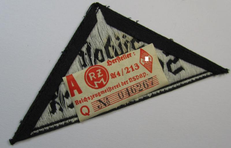 'HJ' ('Hitlerjugend') ie. 'BDM' ('Bund Deutscher Mädel'-) district-triangle (ie. 'Gebietsdreieck') entitled: 'Südost Steiermark' (being a 'virtually mint- ie. unissued' example that still retains its paper-based 'RzM'-etiket)