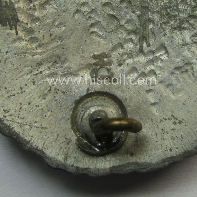 WH (KM) 'Marine-Artillerie-Abzeichen' being a maker- (ie. 'H.A.'-) marked- and/or typical zinc- (ie. 'Feinzink'-) based example by the: 'Hermann Aurich'-company
