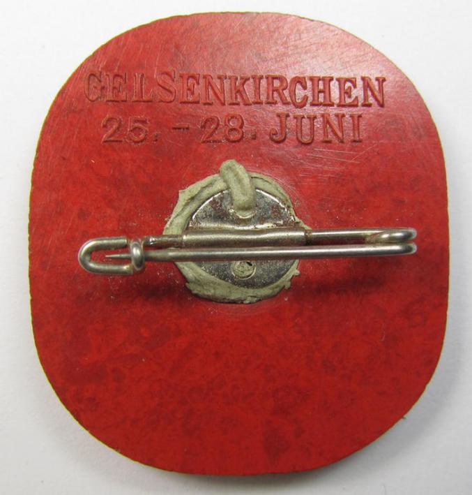Bright-red-coloured- and 'molded'-style, N.S.D.A.P.-related day-badge (ie. 'tinnie' or: 'Veranstaltungsabzeichen') bearing the text: 'Gautreffen - Westfalen-Nord - 1937' (showing the text: 'Gelsenkirchen - 25.-28. Juni' on its back)