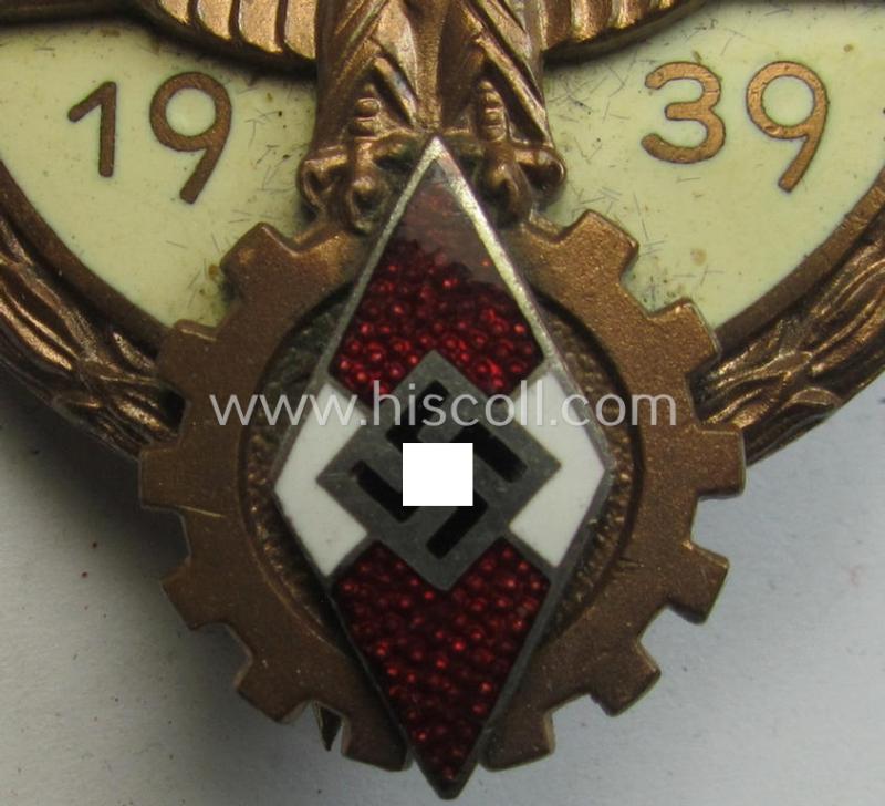 Superb, 'HJ'- ('Hitlerjugend') ie. 'BDM'- ('Bund Deutscher Mädel') related: 'Reichsberufswettkampf-Siegerabzeichen' (of the 2nd model) entitled: 'Kreissieger 1939' and being a neatly maker- (ie.: 'H. Aurich'-) marked example