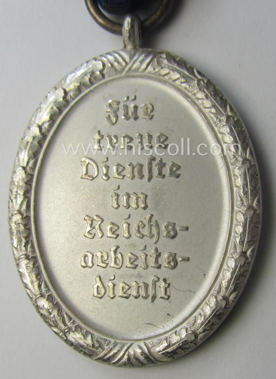 RAD (ie. 'Reichsarbeitsdienst') so-called: 'Dienstauszeichnung 3. Stufe für Männer' (as was intended for 12 years loyal-service) and that came mounted onto its period piece of ribbon (ie. 'Bandabschnitt')