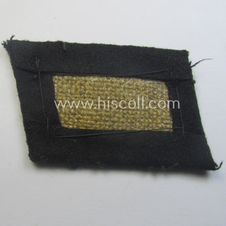 Waffen-SS EM-pattern rank-collar-rank-tab ('Kragenspiegel'): 'SS-Mann'