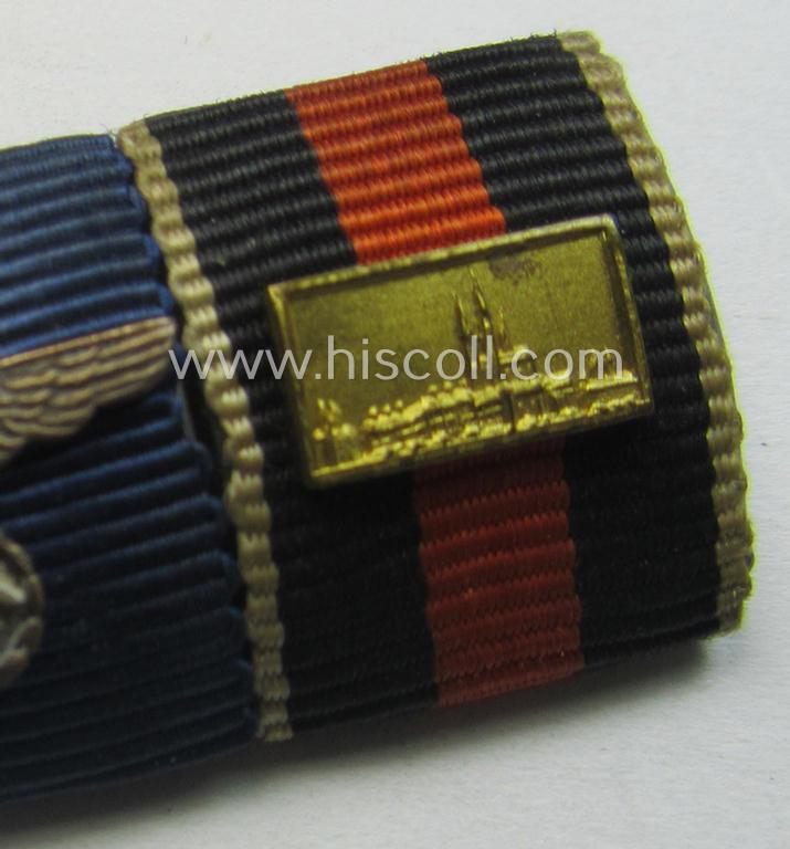 4-pieced, WWII-period ribbon-bar (ie. 'Feld- o. Bandspange') showing various WWII-period awards (amongst which a: Czech 'Anschluss'-medal with attached 'PB-Spange'