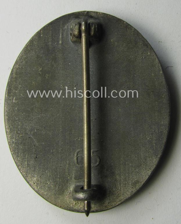 Attractive - and moderately used- and worn! - example of a maker- (ie. '65'-) marked example of a silver-class wound-badge (or: 'Verwundeten-Abzeichen in Silber') as was produced by the 'Hersteller' ie. maker: 'Klein u. Quenzer'