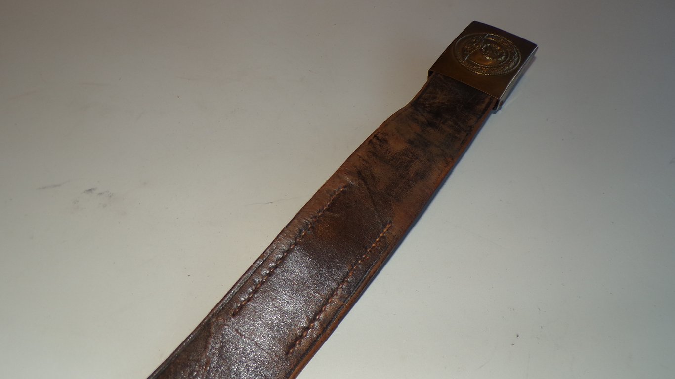 S.A brown leather belt and buckle