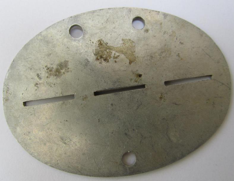 Neat, aluminium-based, WH (Heeres-) ID-disc, bearing the neatly engraved ie. stamped unit-designation: 'Wehrkr.E.Dep.XII' 